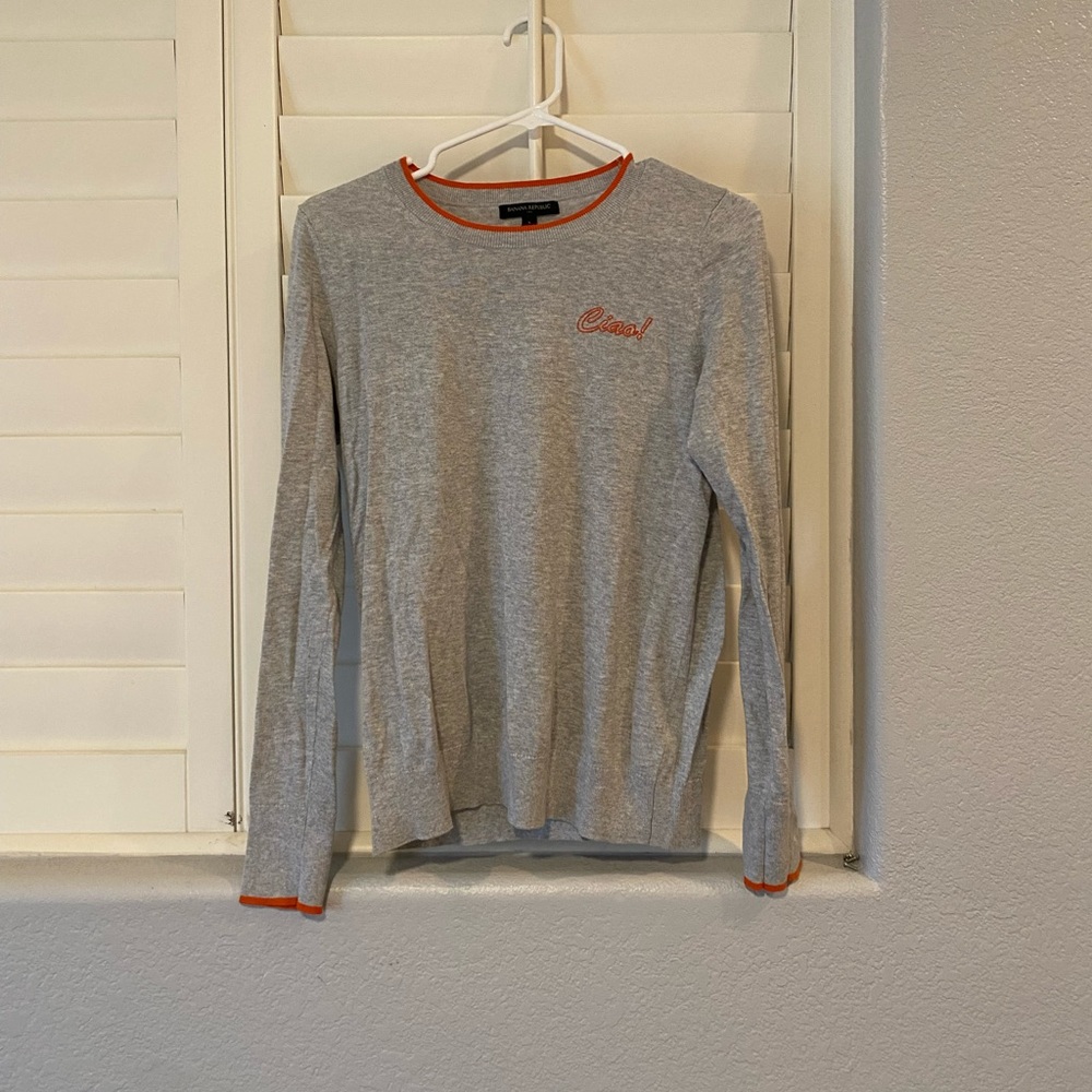 Grey sweater with orange lining